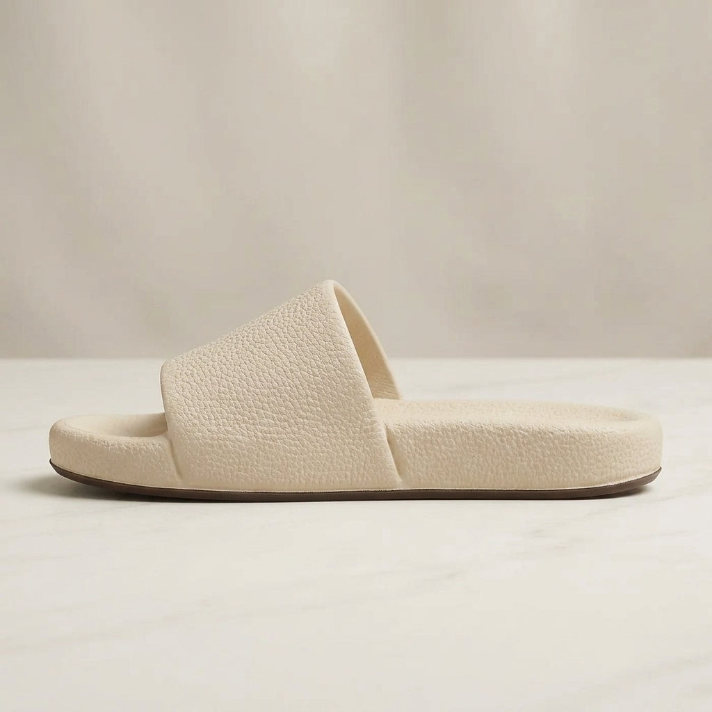 Women's cream comfort slides left side angle