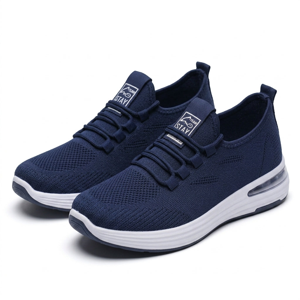 Pair of men's navy blue breathable knit running shoes with white soles and air cushion heels, shown at a three-quarter front angle on a pure white background