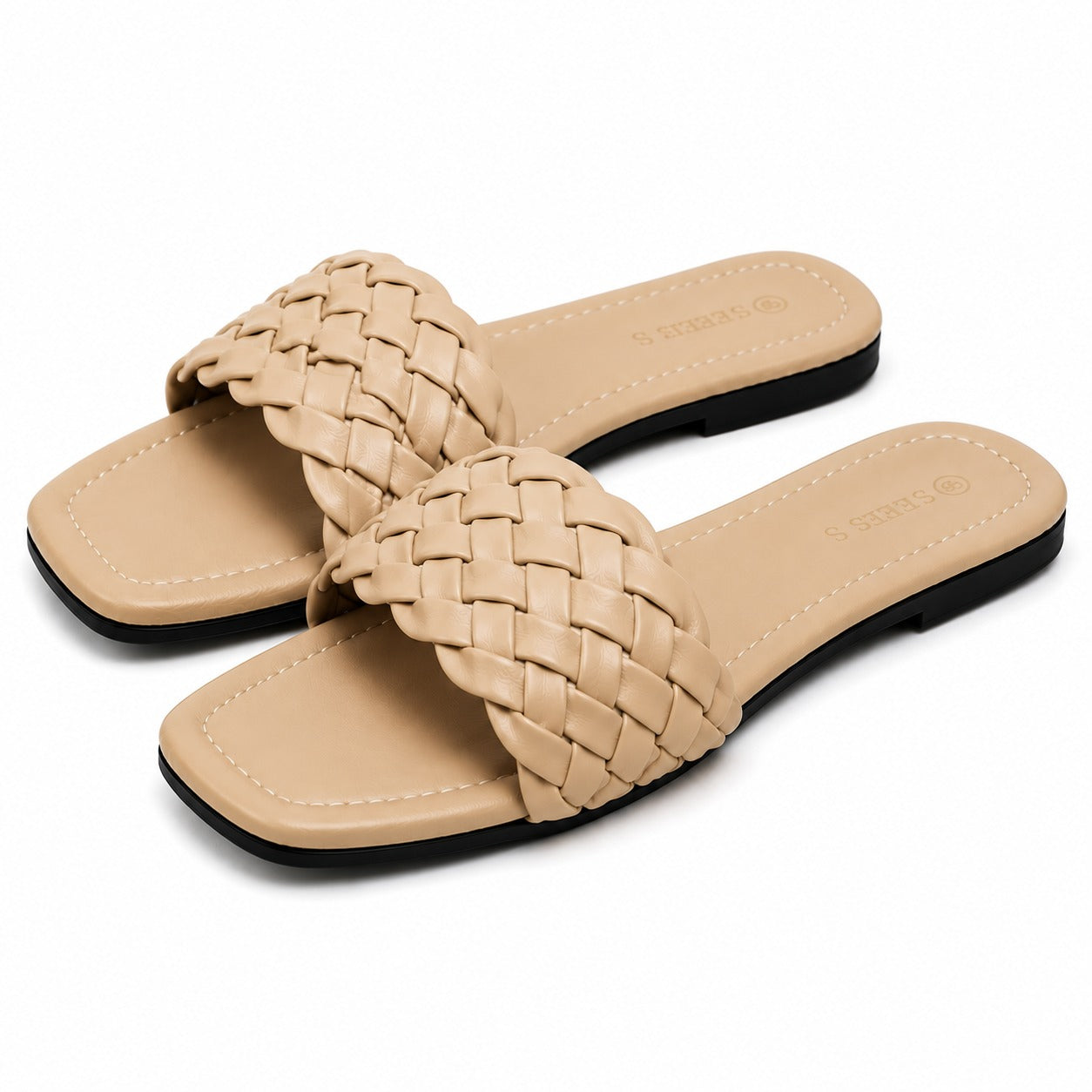 "Minimalist studio photography of a single UHR Collection women's black braided flat slide sandal, shot from a clean side profile angle on a textured beige matte surface."