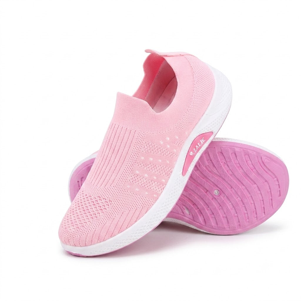 Women's premium pink slip-on walking shoes on white background